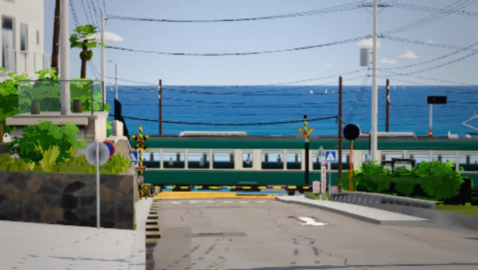 A green tram passes a level crossing above the sea.